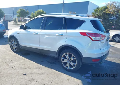 2014 Ford Escape Titanium z USA, uszkodzony, nr VIN 1FMCU0JXXEUD79081